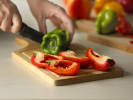 Team Building Cooking Class - Homemade Mexican Dips in Minneapolis: cutting peppers