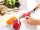 Cooking Class - Flavor-Packed Vegan West African Classics: cutting red bell pepper