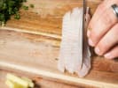 Cooking Class - Prepare an Authentic Neapolitan Dinner Menu in Toronto: cutting white fish fillet