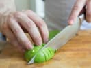 Cooking Class - Bold Caribbean Island Flavors - Date Night in Downtown Dallas: cutting avocado