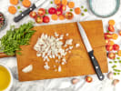 Online Couples Cooking Class - Easy Weekly Meal Prep: diced onions and sliced tomatoes