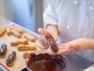 Cooking Class - PÃ¢te Ã  Choux Pastries in Houston: dipping eclairs in chocolate