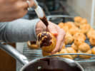 Cooking Class - Elevated Antipasti & Steak in Atlanta: drizzling chocolate over cream puffs