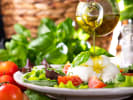 Cooking Class - Authentic Seasonal Table - Date Night in Northern Virginia: drizzling olive oil over tomato Burrata salad