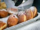 Cooking Class - Make Gourmet Filled Donuts in Northern Suburbs: dusting filled donuts with icing sugar