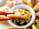 Online Cooking Class - Gyoza Dumplings From Scratch: eating a potsticker with chopsticks