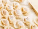 Cooking Class - Hearty Soups and Stews: folded dumplings ready to be cooked
