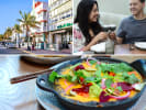 Food Tour + Drink Upgrade - Vibrant Culture of South Beach Miami in Miami: Oceanside Miami people toasting with a specialty cocktail queso