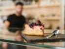 Food Tour - From Bites to Brews in Chinatown & Little Italy in Manhattan: delicious berry NYC cheesecake glass counter