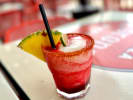 Food Tour - Savor Phoenixâ€™s Eclectic Flavors in Phoenix: a vibrant pink cocktail with lime and pineapple