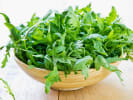 Online Cooking Class - Perfect Spanish Paella: fresh arugula in a bamboo dish