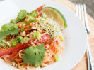 Cooking Class - Perfect Pad Thai Workshop in Carlsbad & Oceanside: fresh pad Thai on a plate with scallion, coriander and lime garnishes