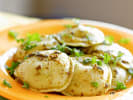 Cooking Class - Kitchen Confidence - Teens' Summer Series in Downtown Dallas: ravioli in a plate with pesto sauce