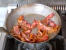 Cooking Class - Essential French Cooking 101: frying bacon in a pan