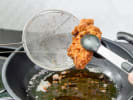 Cooking Class - Southern Comfort Classics in Cincinnati: frying chicken