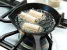 Cooking Class - Classic Asian Takeout: frying egg rolls