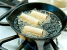 Team Building Cooking Class - Traditional Chinese-Inspired Fare in San Francisco: frying egg rolls