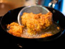 Cooking Class - Craft Onigiri and Japanese Classics in South Seattle: frying karaage chicken