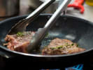 Cooking Class - South American Steak Night - Date Night in Manhattan: frying steak
