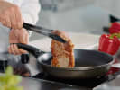 Cooking Class - Surf & Turf Delights - Date Night in Downtown Dallas: frying steak