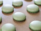 Cooking Class - Festive St. Patrick’s Day Macarons in Downtown Dallas: green macaron shells on a baking tray