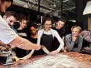 Team Building Cooking Class - A Taste of Teamwork in Manhattan: group making pasta sheets