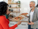 Team Building Cooking Class - Pizza Party: group of people making pizza together