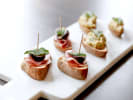 Team Building - Spanish Fare With Flair in Austin: ham, manchego and fig crostini