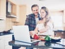 Online Cooking Class - Red Curry Salmon and Thai Tea: happy couple taking virtual cooking class