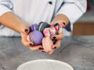 Cooking Class - Decorate Chic French Macarons in Las Vegas: holding colorfully painted macarons