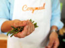 Cooking Class - Timeless Farm-to-Table Cooking in Northern Suburbs: holding fresh asparagus