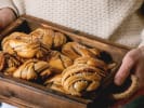 Cooking Class - Cozy Swedish Baking Favorites in Downtown Dallas: holding fresh cardamon buns