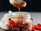 Online Cooking Class - Handcrafted Hot Sauce: hot sauce in a spoon and in a jar