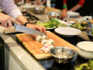 Team Building Cooking Class - Rolls and More in San Francisco: Cutting sushi