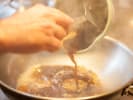 Cooking Class - Vegan Cooking in East Bay: pouring sauce