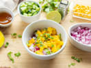 Cooking Class - Make a Hearty Thai Spread in Downtown Dallas: making mango and cucumber salad