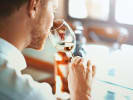 Virtual Wine Tasting - Women-Owned Premium Canned Wine: man tasting white wine
