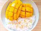 Cooking Class - Thai Flavors For All: mango sticky rice dessert on a white plate
