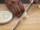 Team Building Cooking Class - Authentic Spanish Fare: mincing garlic