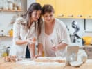 Online Cooking Class - Handmade Pasta With Sicilian Sauce: mother and daughter taking a virtual cooking class