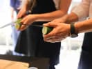 Team Building Cooking Class - Rolls and More in San Francisco: Cutting cucumbers