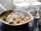 Online Cooking Class - Pantry Paella: cooking paella in a pan