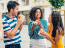 Food Tour + Drink Upgrade - Explore 12 South's Culinary Scene in Nashville: people eating a burger on a food tour
