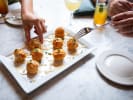 Food Tour - Little Havana Culture and Cuisine in Miami: people sharing plate of croquetas