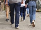 Food Tour - Exploring Bustling Buckman in Portland, OR: people walking down a sidewalk on a food tour