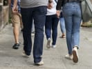 Food Tour - Signature Flavors of New Orleans in Downtown Los Angeles: people walking on a food tour in new orleans