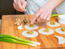 Online Cooking Class - Japanese Potstickers and Mojitos: person making shrimp potstickers