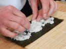 Team Building Cooking Class - Rockin' Sushi Rolls in Boston Proper: person making sushi