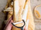 Cooking Class - Gourmet Vegan: person peeling parsnips