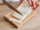 Online Cooking Class - Bountiful Charcuterie Boards: person slicing blue cheese